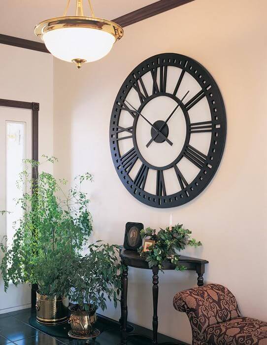 Công dụng lớn nhất của đồng hồ treo tường trang trí phòng khách là gì?